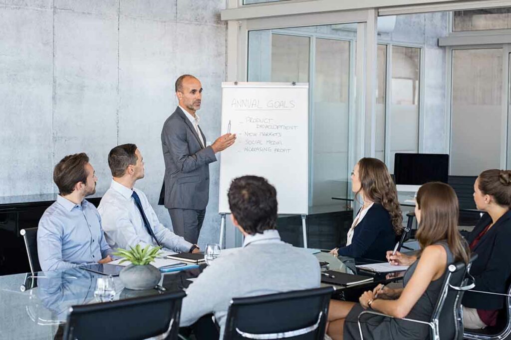 A Man holds a presentation in the Leadership Training Course